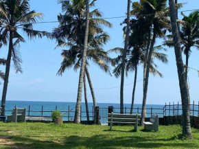 Thodiyil beach view twin bedroom cottage varkala